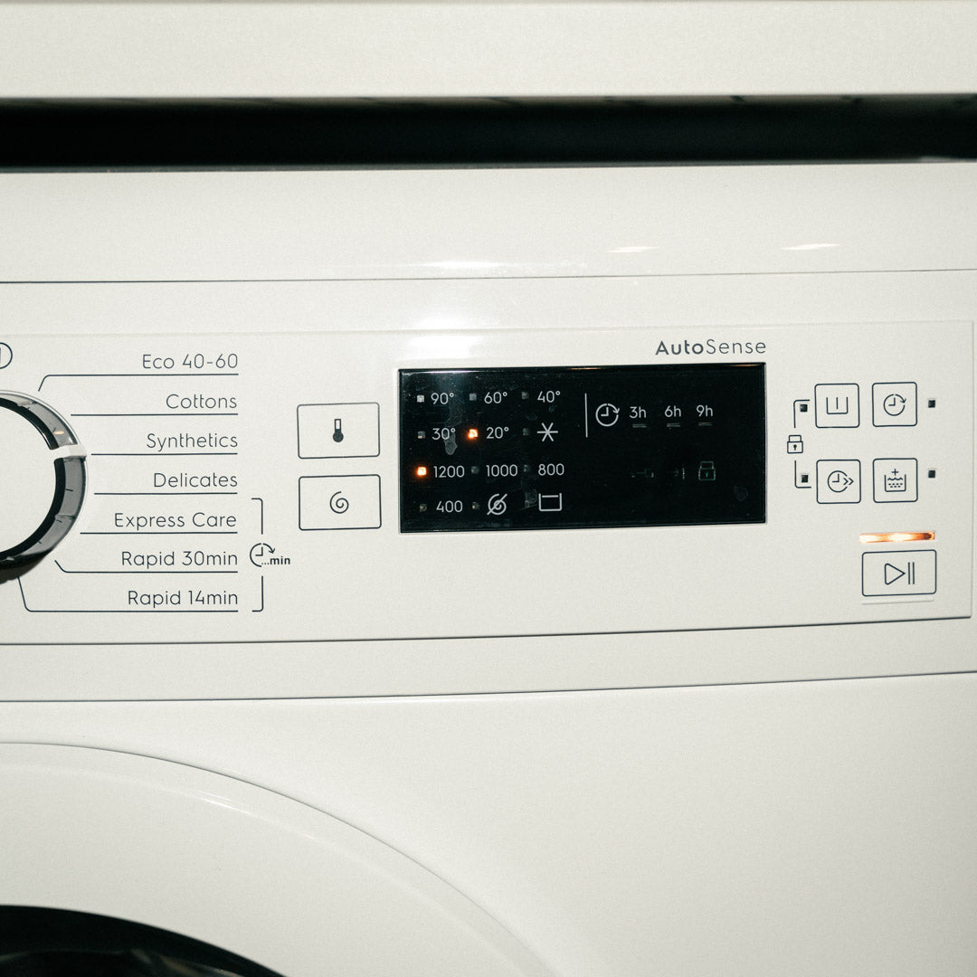 Closeup on the control panel of a washing machine temperature setting